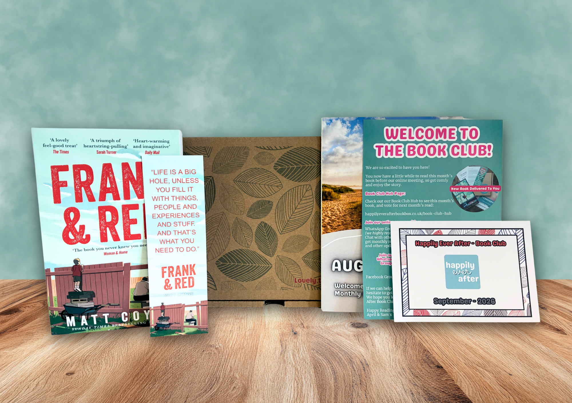 The HEA Book Club box featuring Frank and Red and welcome materials
