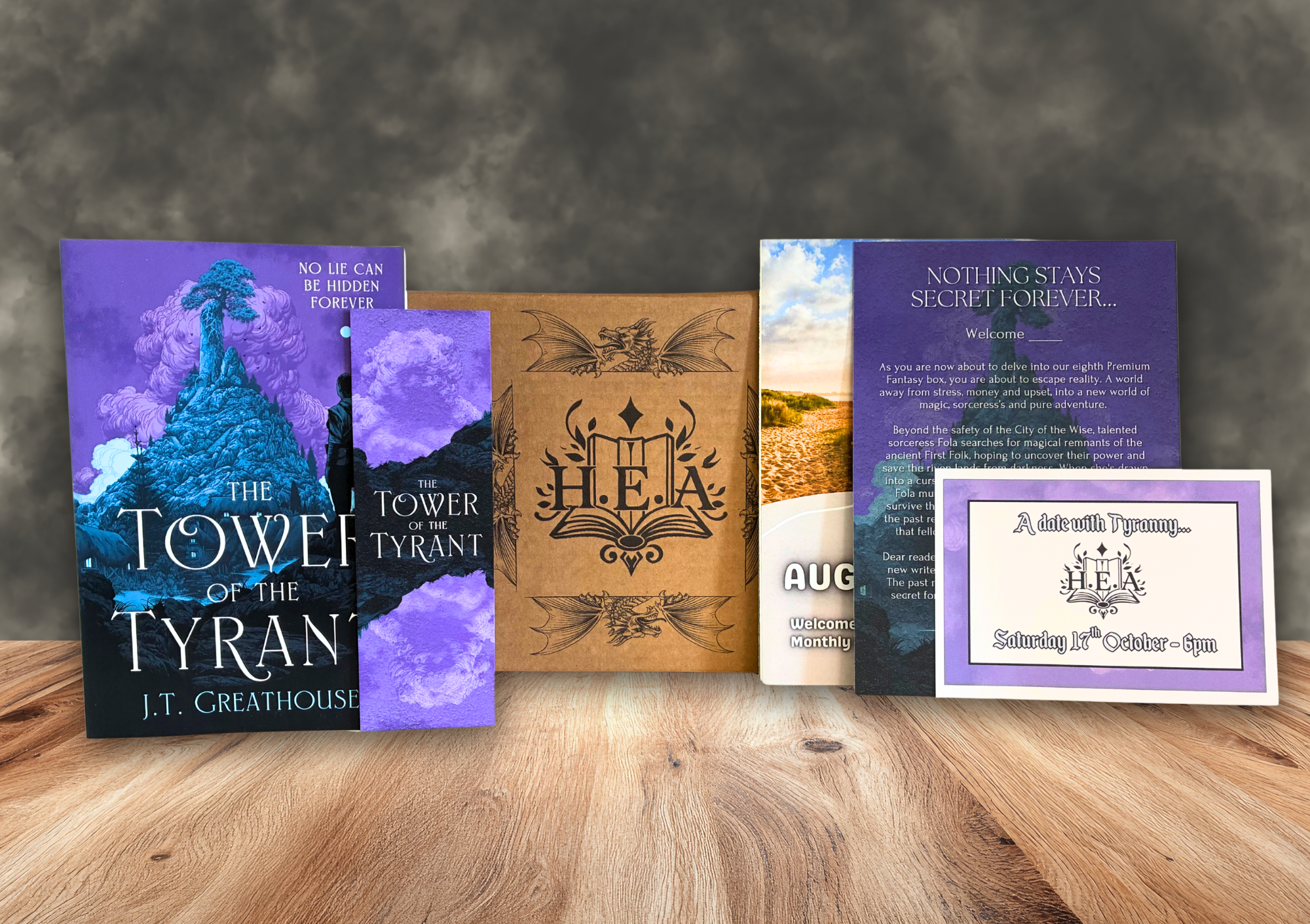 The Fantasy Book Club box with a book, bookmark and themed extras